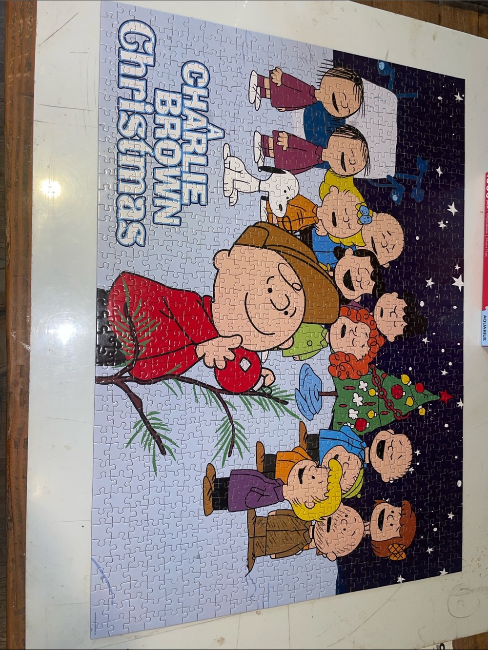 1,000 Piece - Peanuts Charlie Brown Christmas Puzzle – Red, Green, Blue, Yellow
